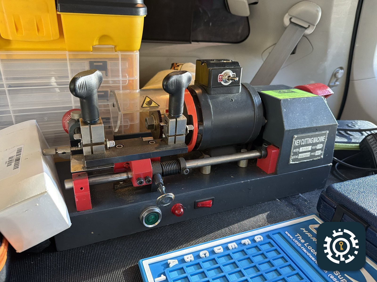 Professional key cutting machine set up inside the service van